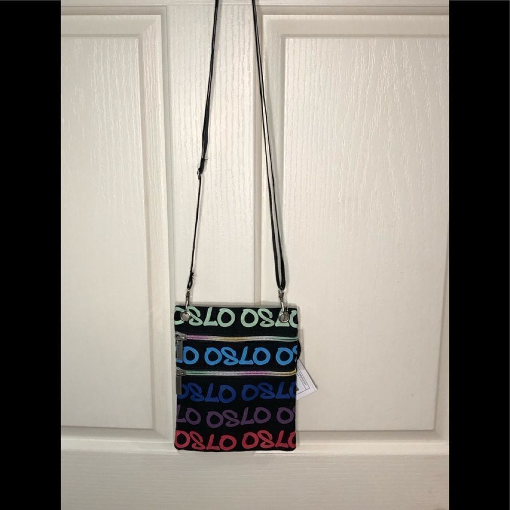 Robin Ruth Black Crossbody Travel Bag with Rainbow 'OSLO' Print